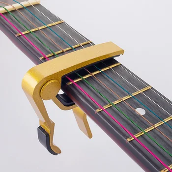 Гитарный Капо Обтекаемый Алюминиевый зажим для гитарных струн с пружинной силиконовой ручкой из нержавеющей стали Красного цвета